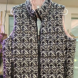 Reversible puffer vest. Never worn.